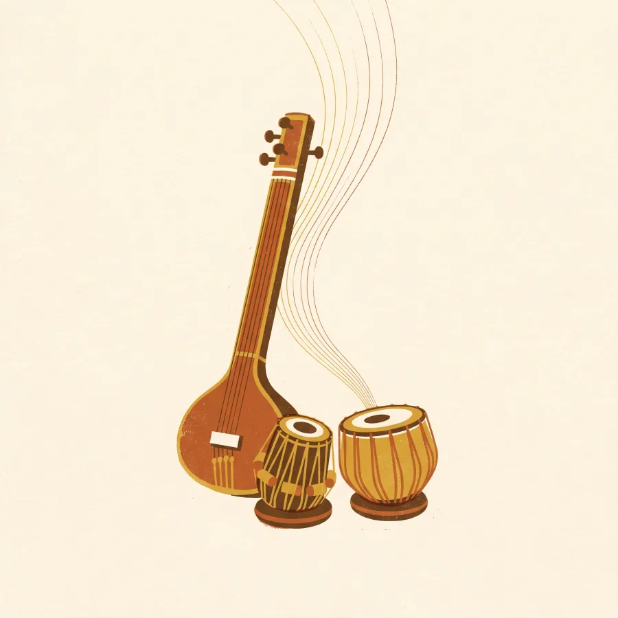 A tanpura standing above a pair of tabla drums