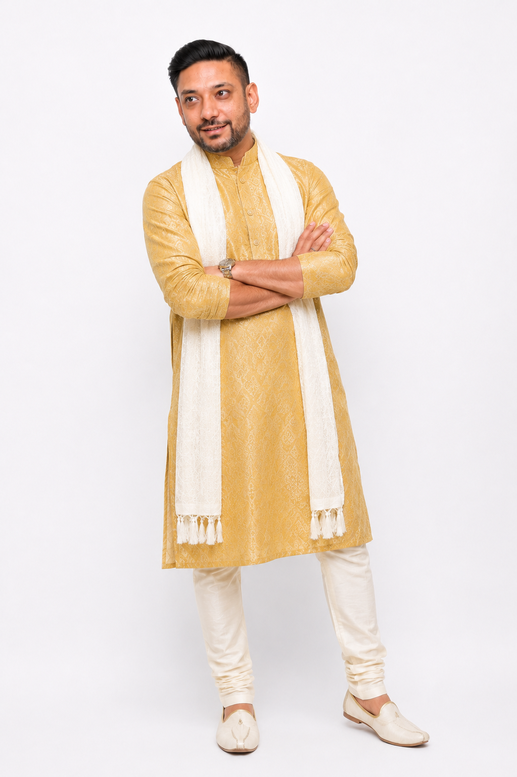 Vipul Nagnesia in a gold silk kurta with an ivory shawl